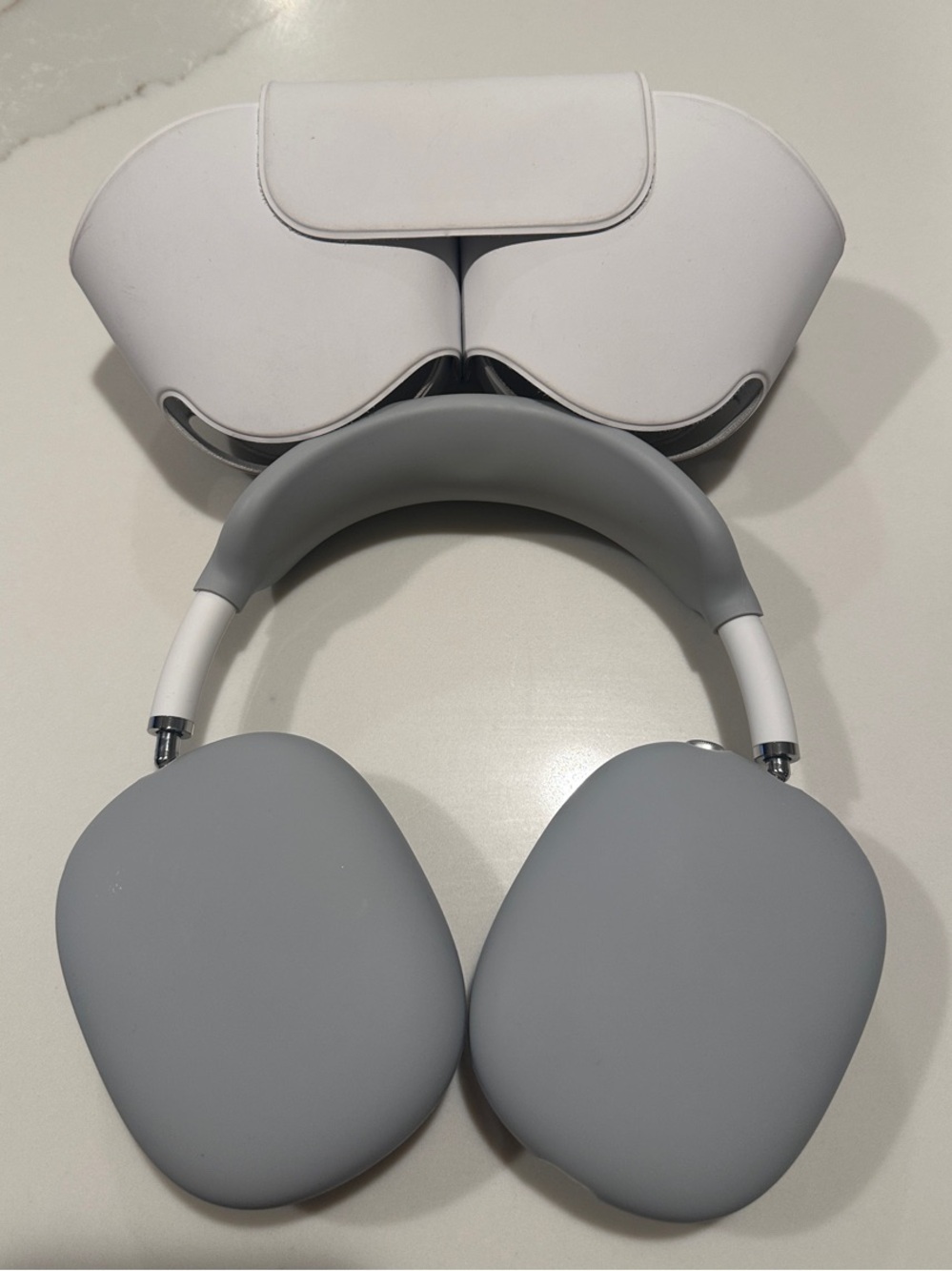Apple Headset and Over-Ear Headphones in White and Gray